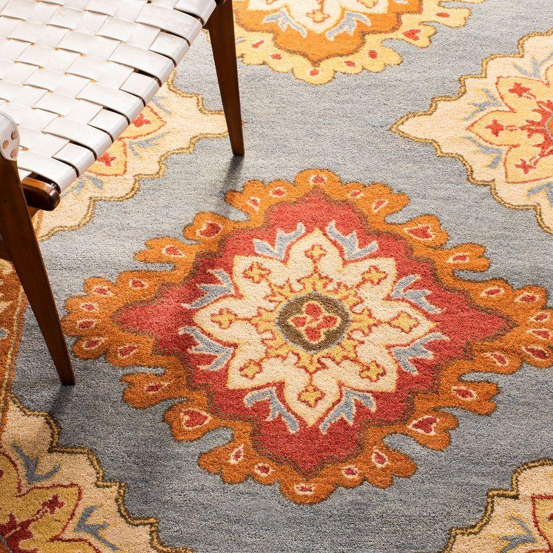 Heritage HG408 Handmade Area Rug - 8'x10' - Blue/Rust - Safavieh