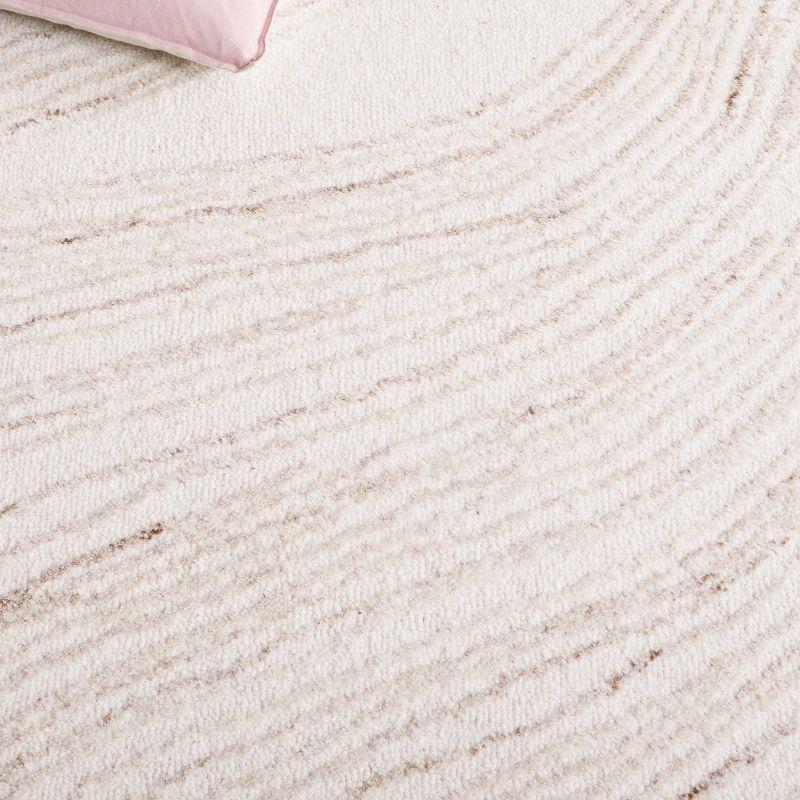 Ebony EBN551 Hand Tufted Area Rug - Ivory/Beige - 6'x9' - Safavieh.