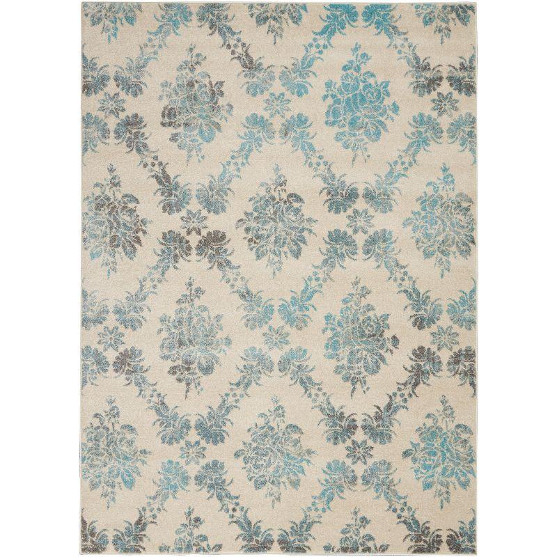 Elegant Ivory and Turquoise Floral Synthetic 6' x 9' Area Rug