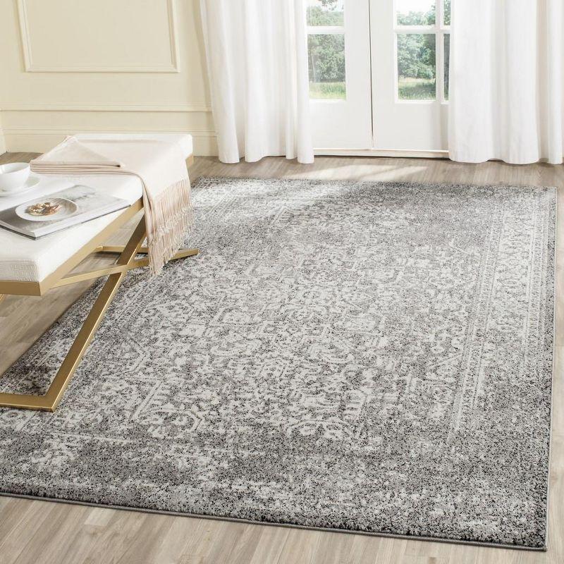 Transitional Grey & Ivory Synthetic 6'7" x 9' Area Rug