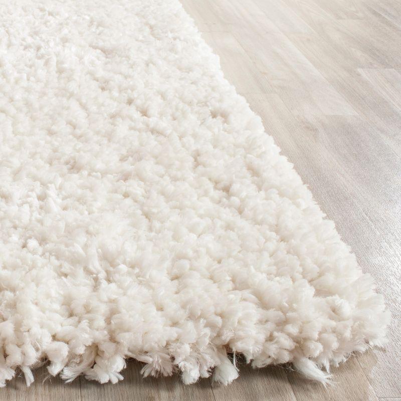 Ivory Hand-Tufted Shag Wool and Synthetic Area Rug 4' x 6'