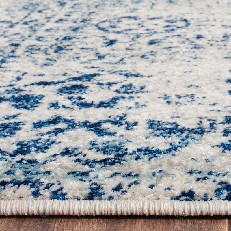 Ivory and Blue High Pile Synthetic Area Rug