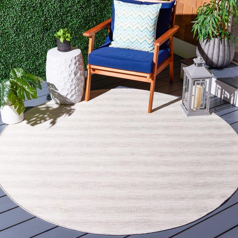 Ivory and Grey Round Synthetic Indoor/Outdoor Rug