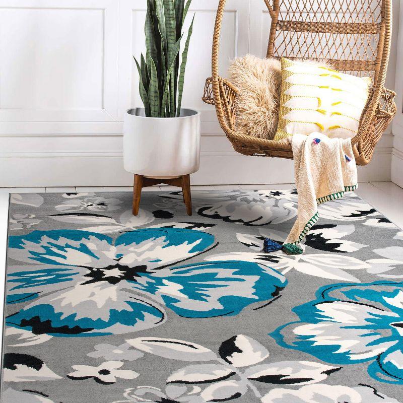 Modern Floral Blue Synthetic 6'6" x 9' Easy-Care Area Rug