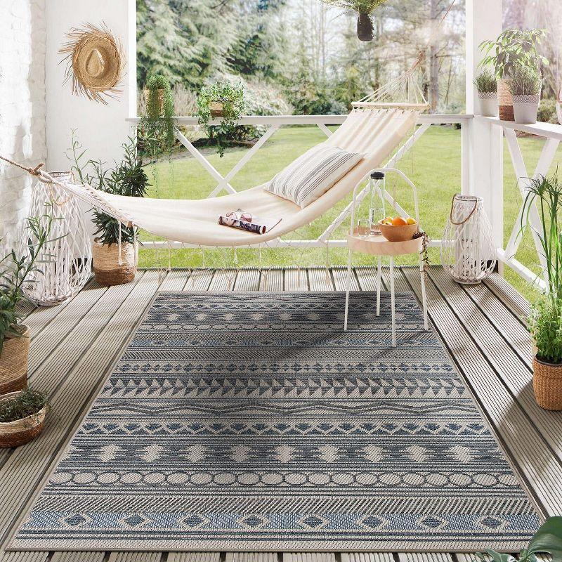 Blue Geometric 5' x 7' Synthetic Reversible Area Rug