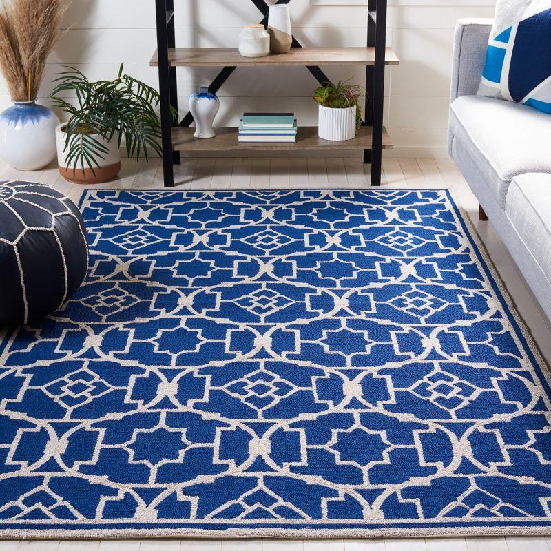 Handmade Ivory and Blue Floral Synthetic 4' x 6' Rug