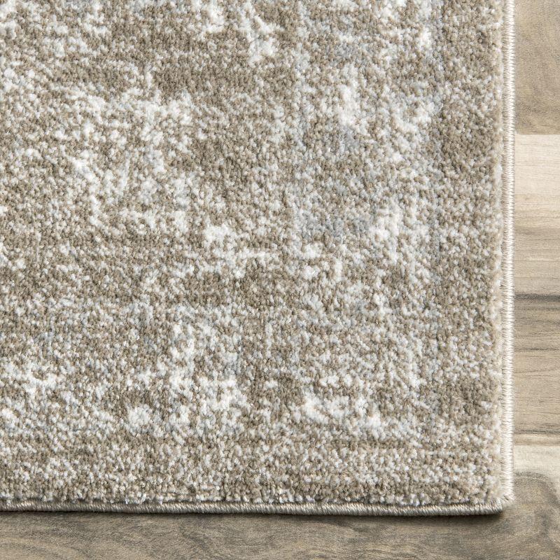 Lindsay Vintage Brown Synthetic 5' x 7' Easy-Care Area Rug