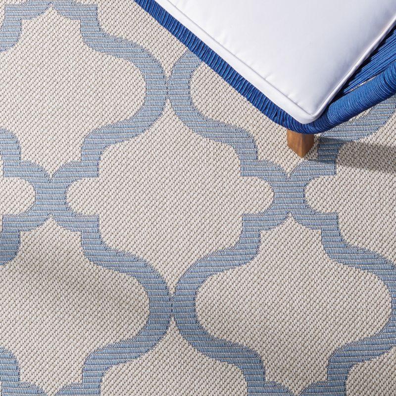 Bermuda BMU810 Power Loomed Indoor/Outdoor Machine Washable Area Rug - Ivory/Blue - 6'7"x9'2" - Safavieh
