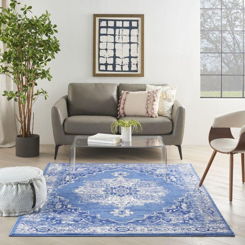 Navy Floral 6' x 9' Synthetic Rectangular Area Rug