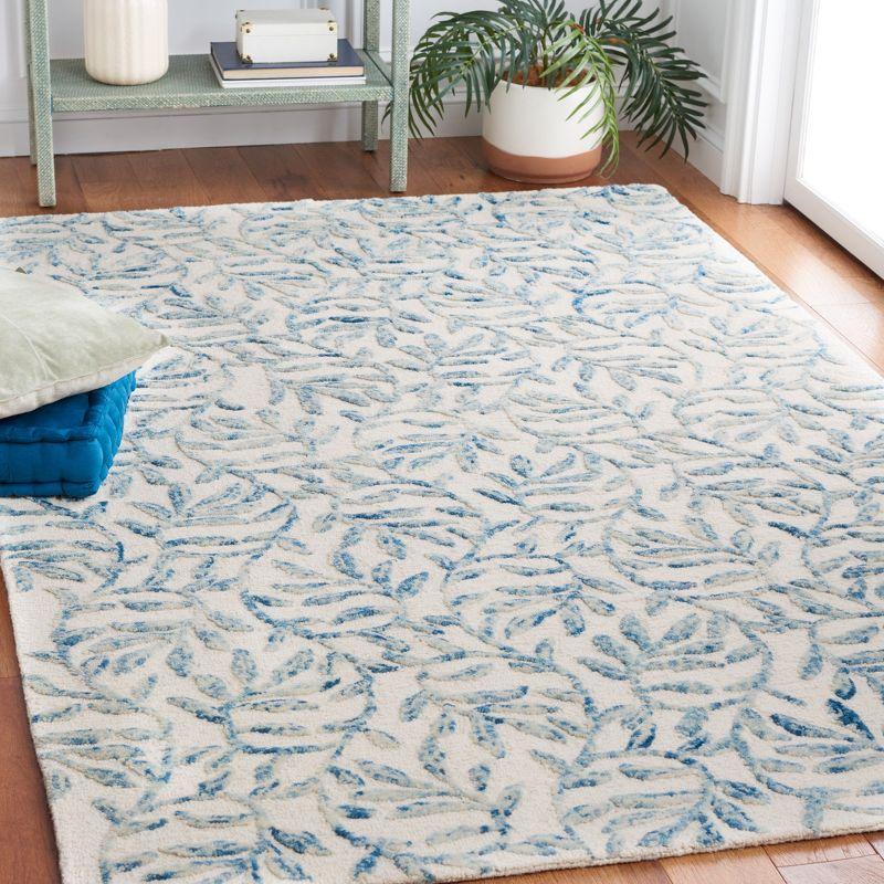 Ivory and Blue Floral Hand-Tufted Wool Area Rug 4' x 6'