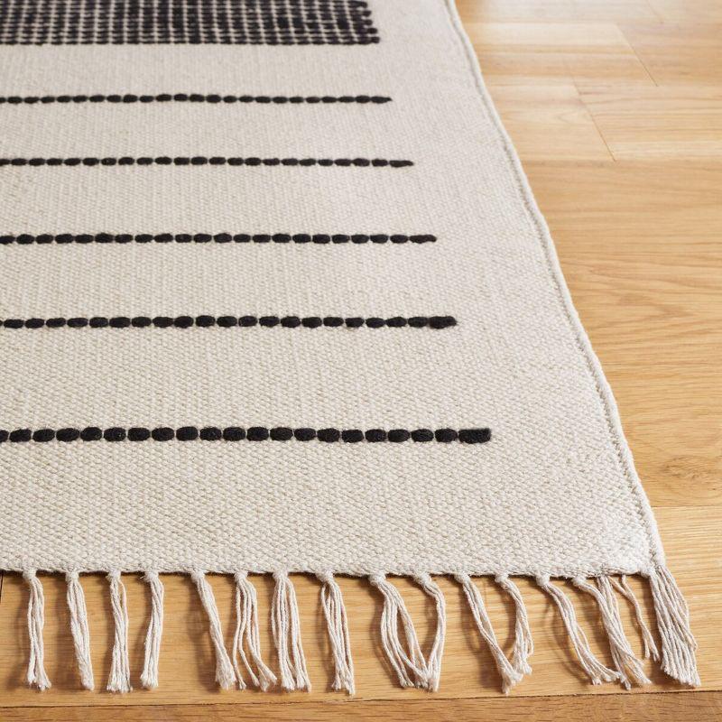 Black and Ivory 4' x 6' Hand Woven Wool Cotton Area Rug