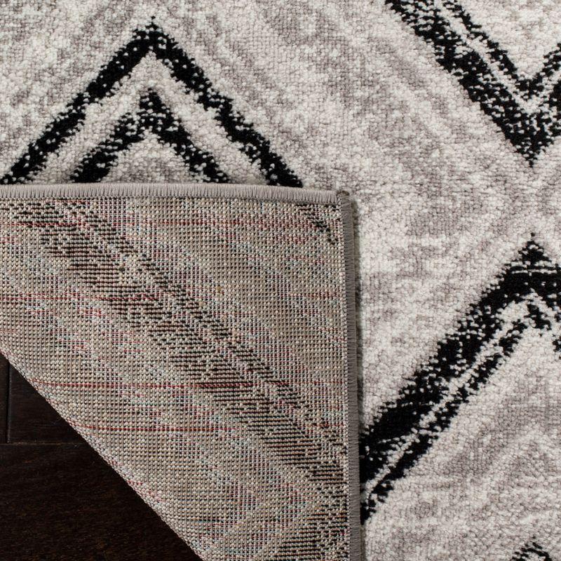 Skyler Geometric Silver Synthetic 9' x 12' Area Rug