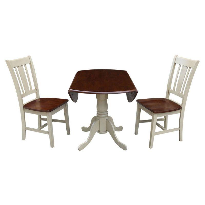 Antiqued Almond Dual Drop Leaf Dining Set with San Remo Chairs