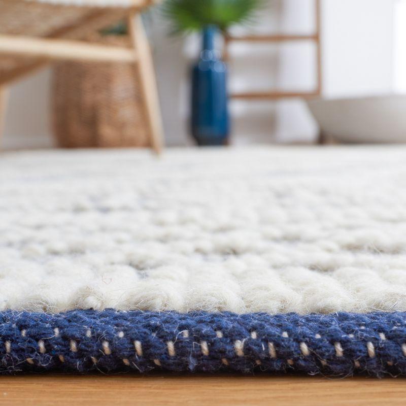 Ivory and Navy Handwoven Wool Rectangular Rug