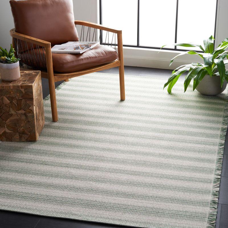 Ivory and Green Stripe Synthetic 5' x 7' Area Rug