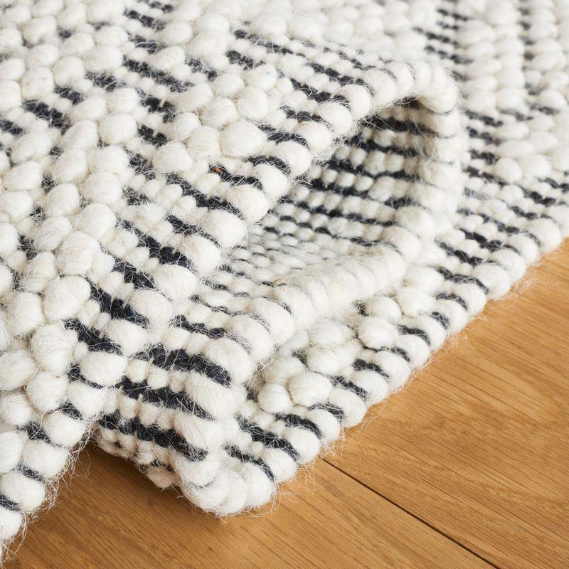 Handwoven Ivory and Black Wool 4' x 6' Area Rug