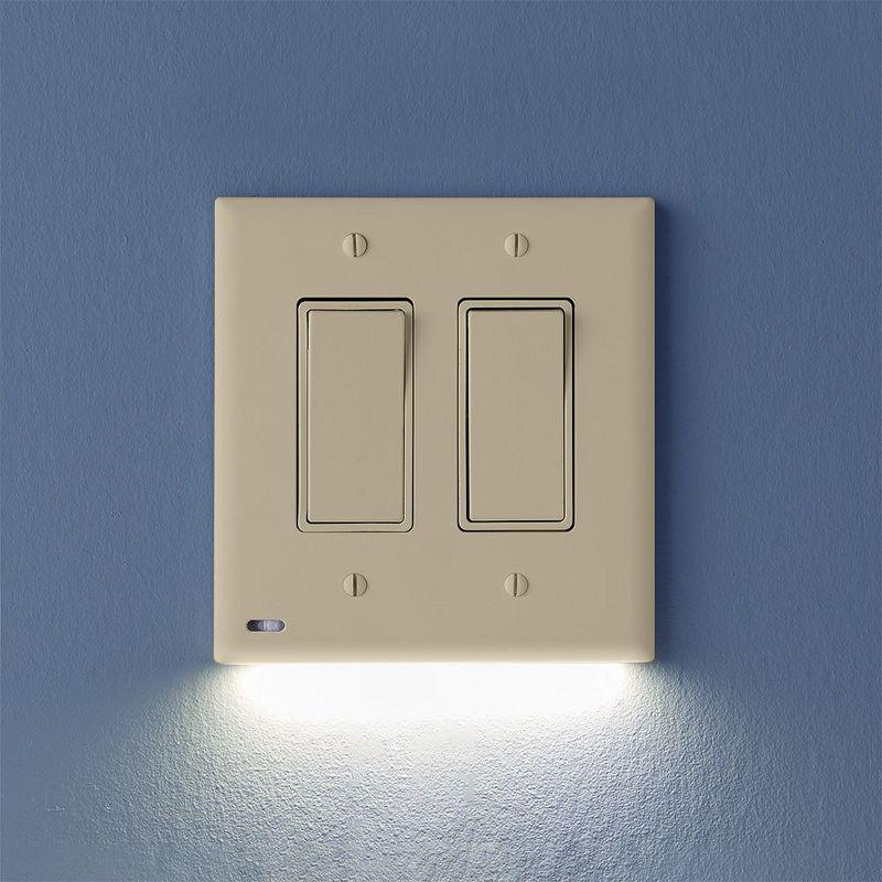 Ivory Rocker Triple-Gang Wall Plate with LED Night Lights