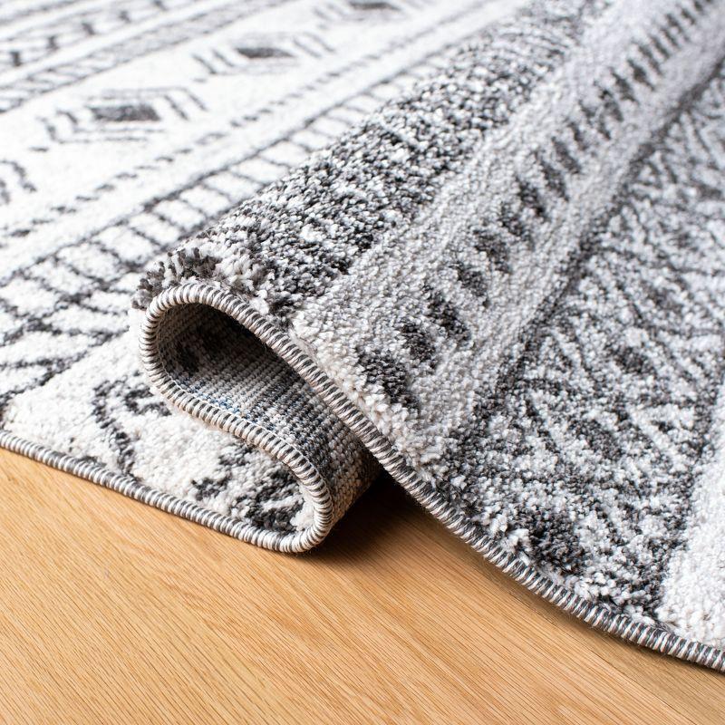Tunisia TUN735 Power Loomed Area Rug - Ivory/Black - 8'x10' - Safavieh.