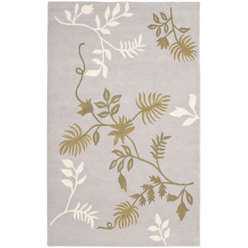 Soho SOH313 Hand Tufted Area Rug  - Safavieh