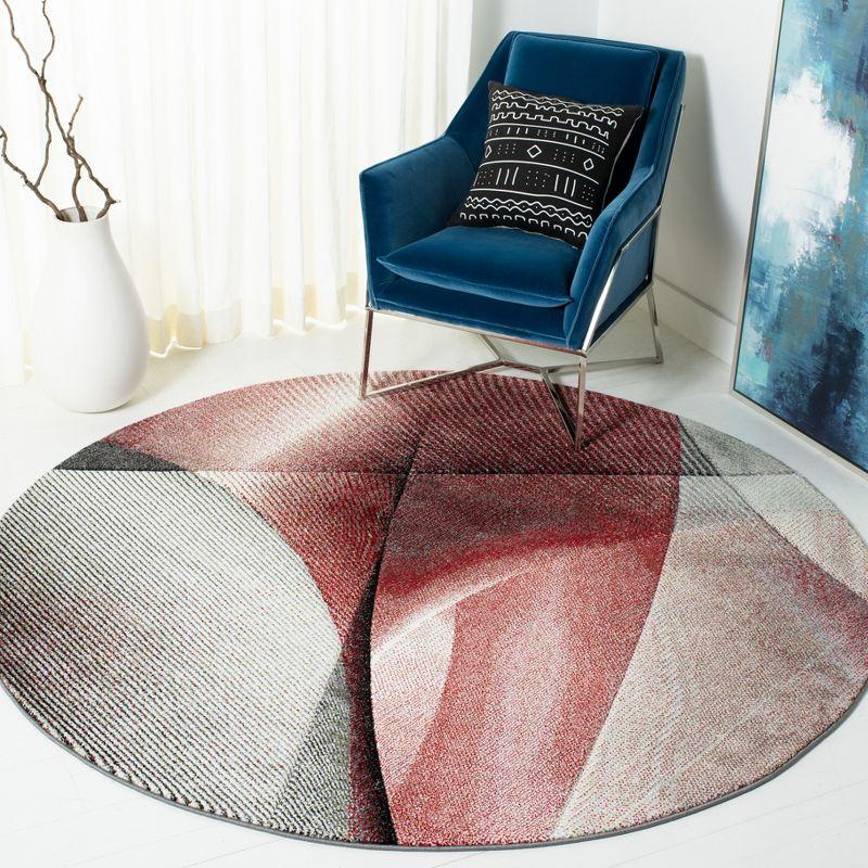 Handmade Grey and Red Round Synthetic Area Rug