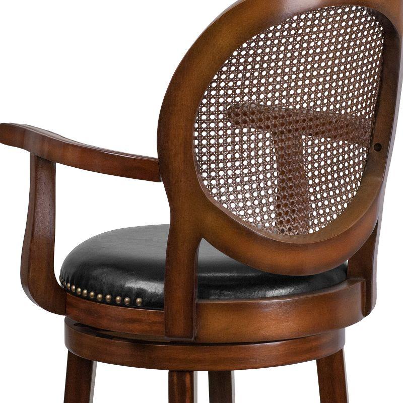 Merrick Lane 26" Swivel Counter Stool with Oval Rattan Back, Arms and Black Faux Leather Upholstered Swivel Seat in Espresso