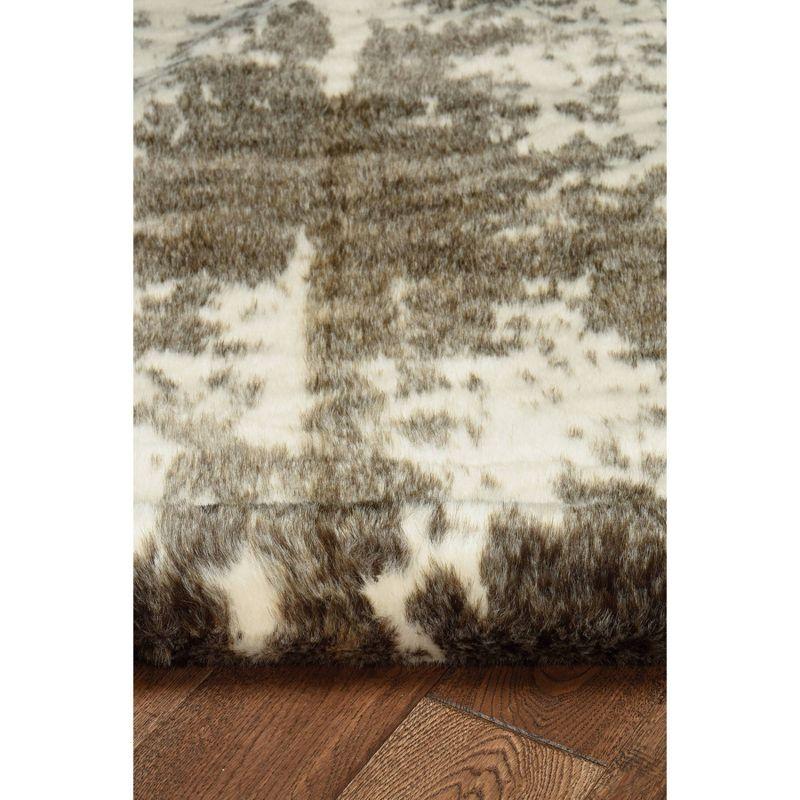 Exotic Faux Cowhide 5'x6'6" Rug in Black Spot Synthetic Easy Care