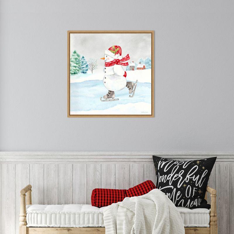 Amanti Art Let it Snow Blue Snowman V by Cynthia Coulter Canvas Wall Art Print Framed 22 x 22-in.