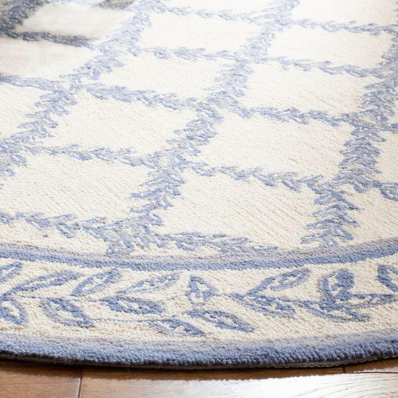 Ivory and Light Blue Round Tufted Wool Area Rug