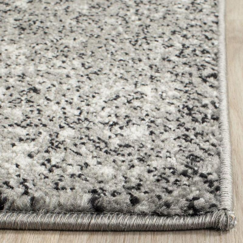 Transitional Grey & Ivory Synthetic 6'7" x 9' Area Rug