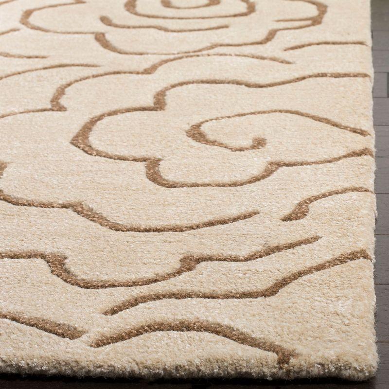 Handmade Beige and Multi Tufted Wool Area Rug