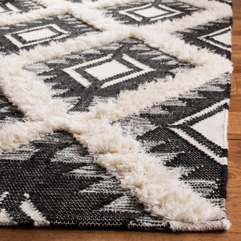 Handwoven Black and Ivory Wool Tribal Area Rug 6' x 9'