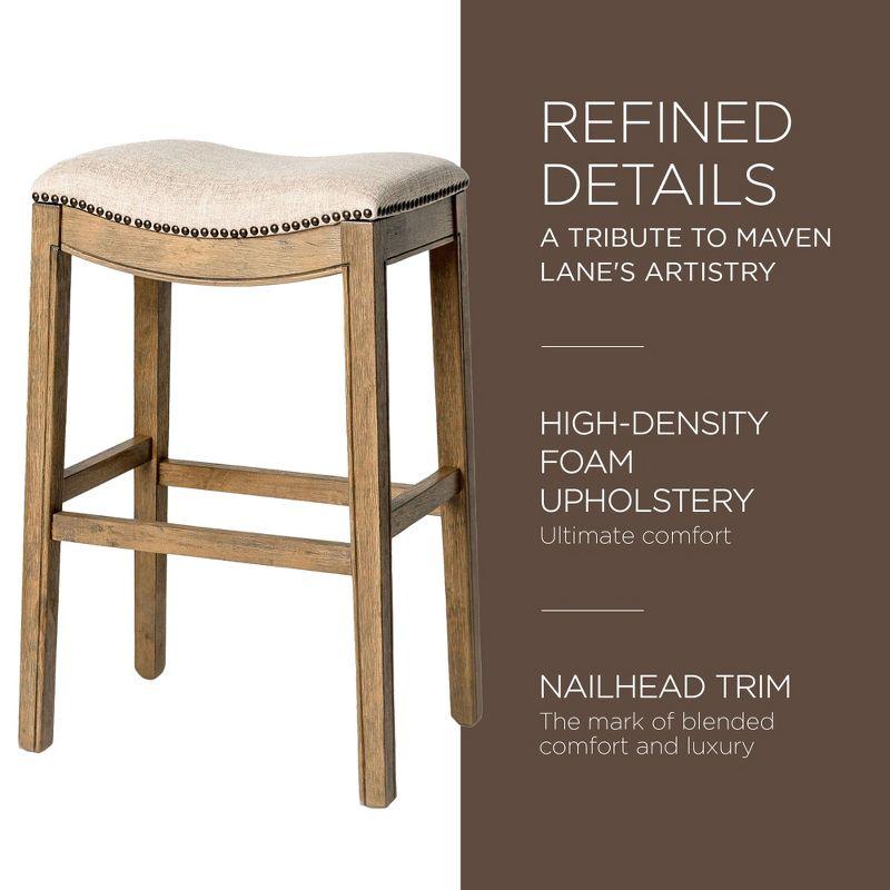 Maven Lane Adrien 31 Inch Bar Height Upholstered Backless Saddle Barstool in Natural Wood Finish with Wheat Cream Fabric Cushion Seat, Set of 2
