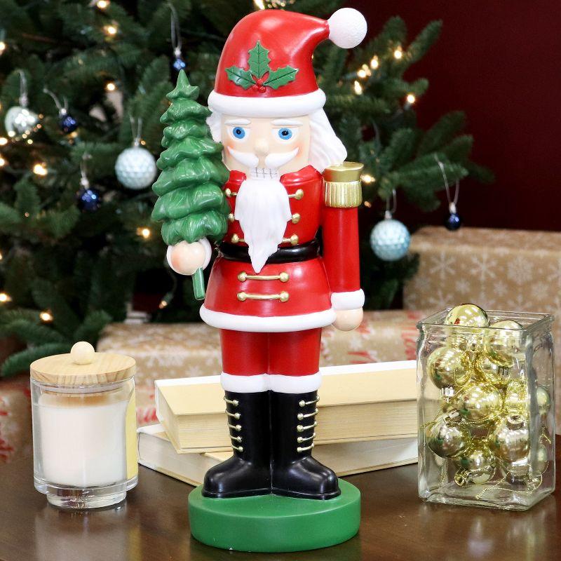 Sunnydaze Small Indoor Christmas Nutcracker Statue - Santa Claus with Tree - Red/Green - 16.75"