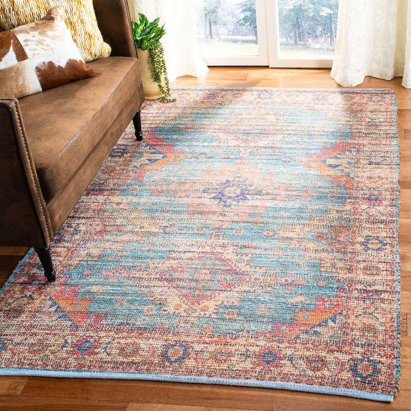 Saffron Blue and Rust Hand Loomed Cotton Area Rug