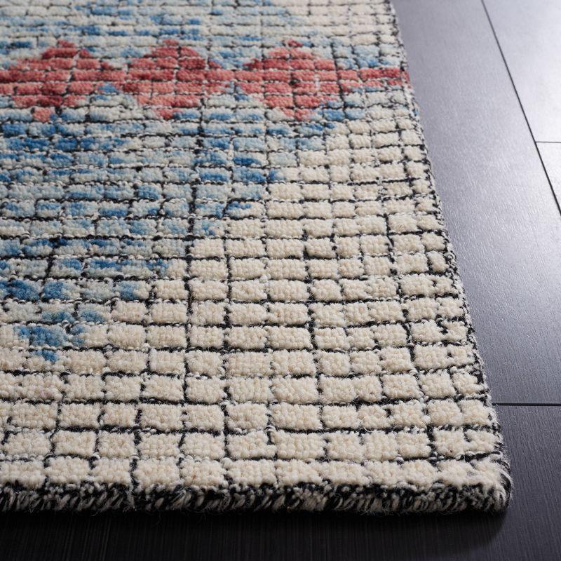 Ivory and Blue Abstract Handmade Wool 5' x 8' Area Rug