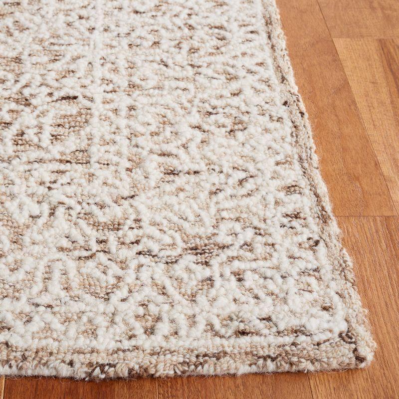 Ivory and Brown Tufted Wool 4' x 6' Handmade Rug