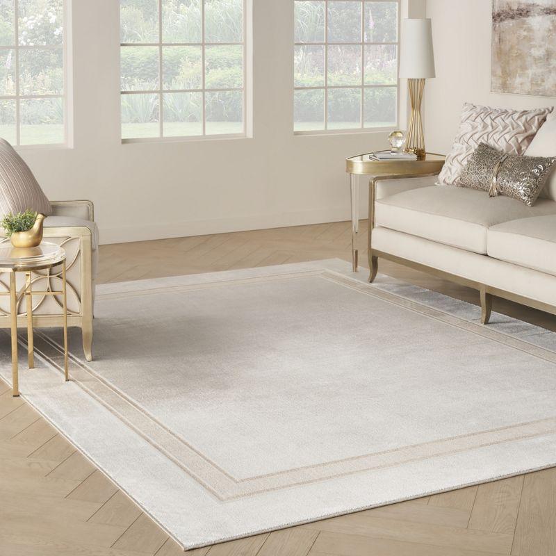 Ivory Cream Geometric 8' x 10' Easy-Care Synthetic Area Rug