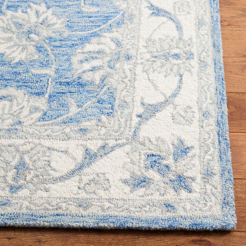 Hand-Tufted Artisan Wool Blue Rectangular Rug - 2x3 Feet