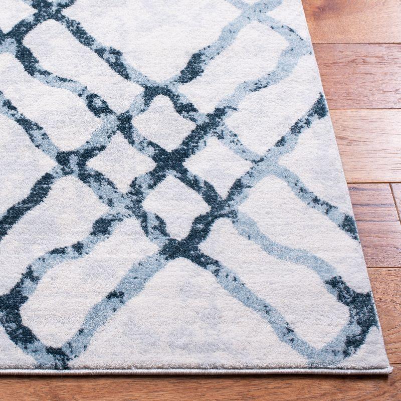 Ivory and Turquoise Geometric Tufted Wool Area Rug