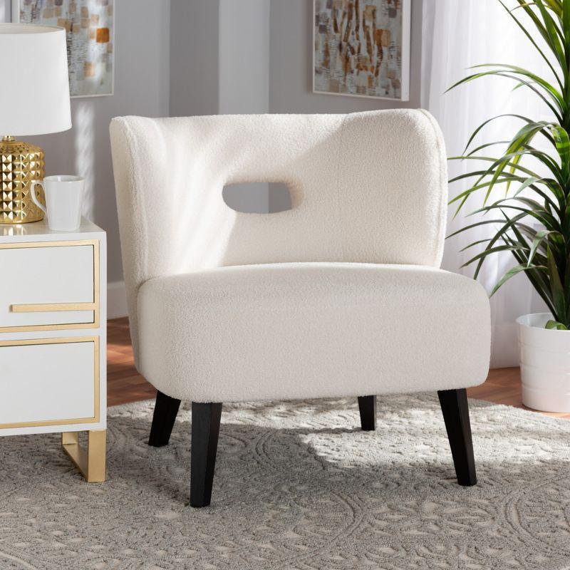Baxton Studio Naara Modern and Contemporary Ivory Boucle Upholstered and Black Finished Wood Accent Chair
