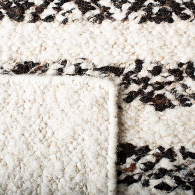 Handmade Black and Ivory Wool Tufted Area Rug 4' x 6'