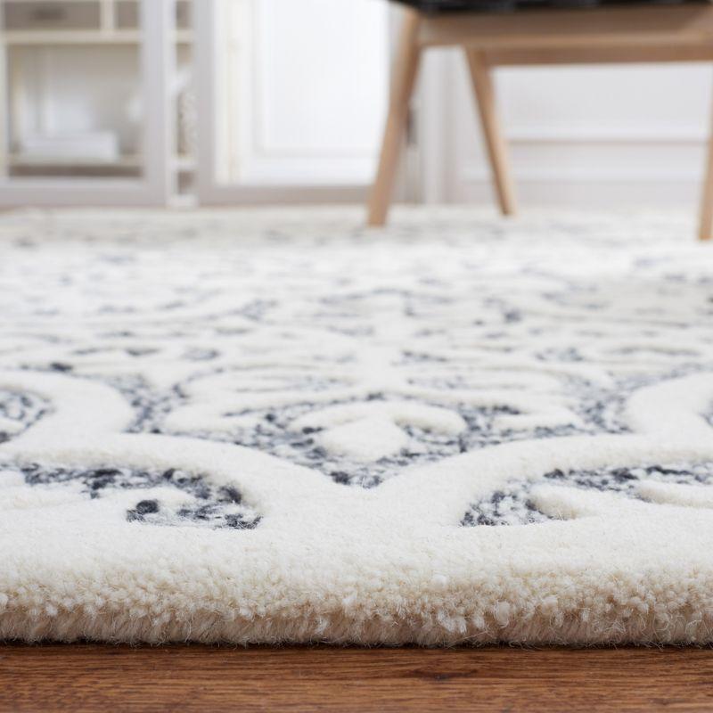 Metro MET859 Hand Tufted Area Rug  - Safavieh