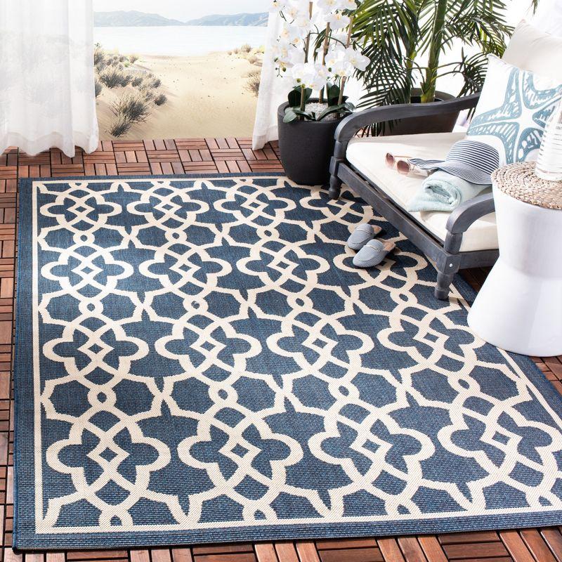 Navy and Beige Geometric Synthetic Area Rug, 4' x 5'7"