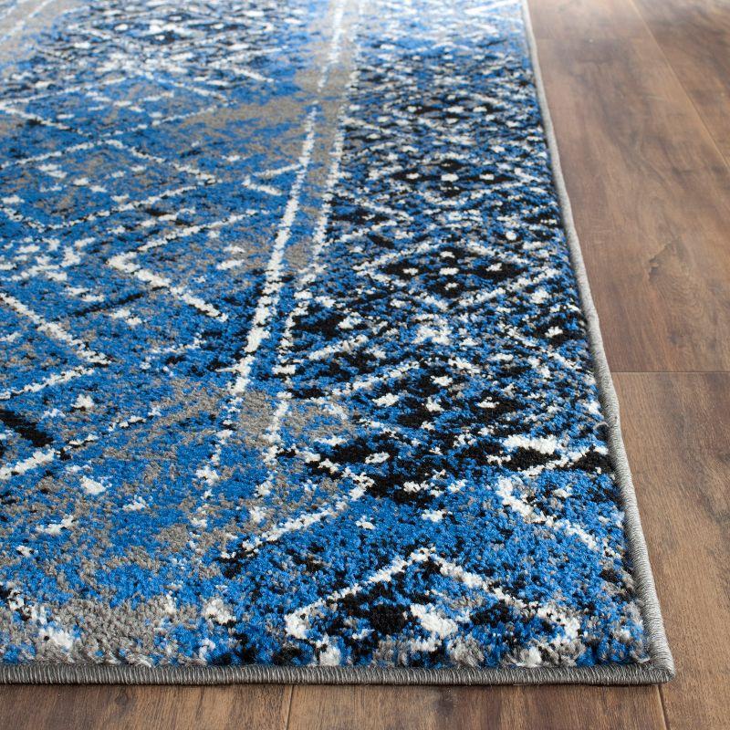 4' x 6' Silver and Multicolor Geometric Synthetic Area Rug