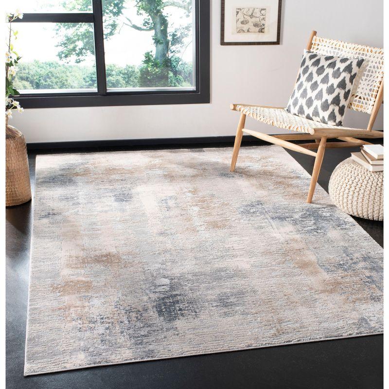 Abstract Ripple Cream/Grey Synthetic 8' x 10' Area Rug