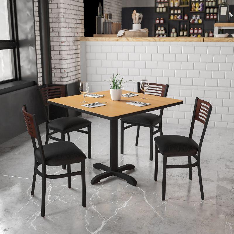 Flash Furniture HERCULES Series Black Slat Back Metal Restaurant Chair - Walnut Wood Back, Black Vinyl Seat