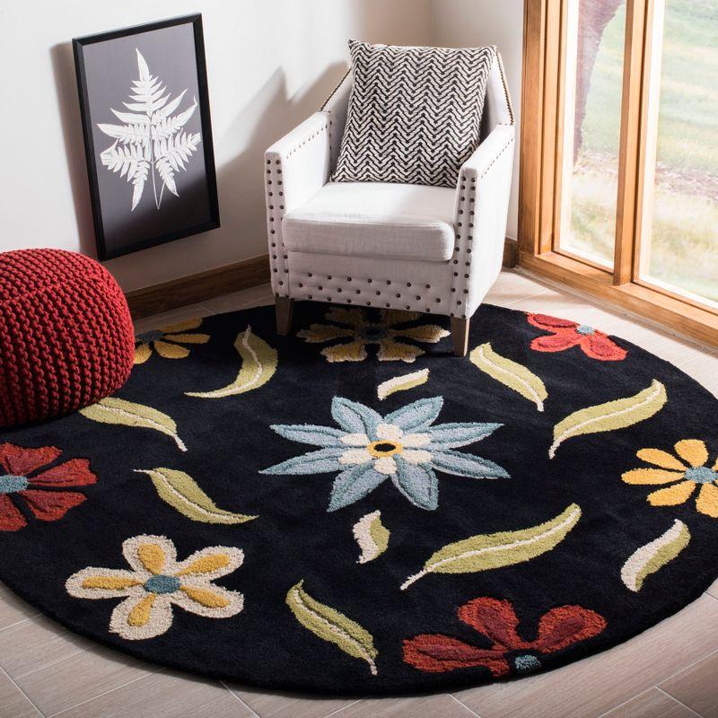 Handmade Black Floral Wool Round Area Rug, 6' x 6'