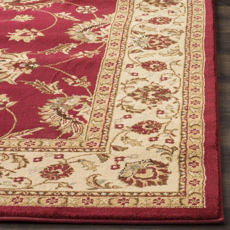 Red and Ivory 4' x 6' Synthetic Safavid Style Area Rug