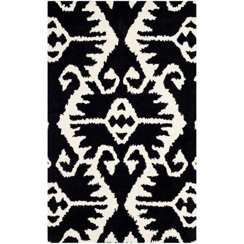 Wyndham WYD323 Hand Tufted Indoor Accent Rug - Black/Ivory - 2'6"x4' - Safavieh.