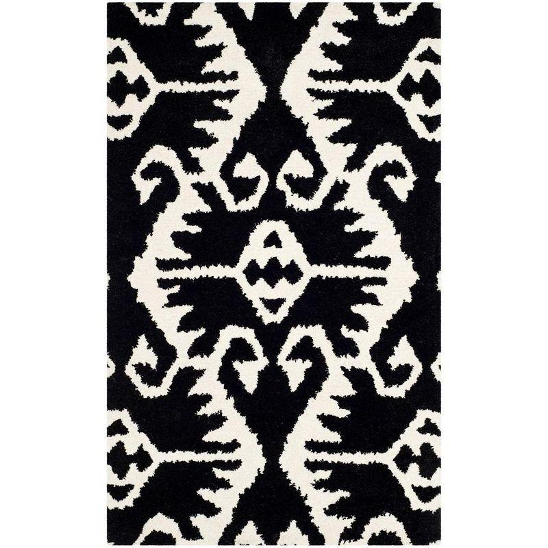 Handmade Black and Ivory Tufted Wool Area Rug